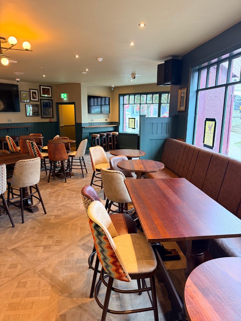 Completed — window seating with Thistle branding