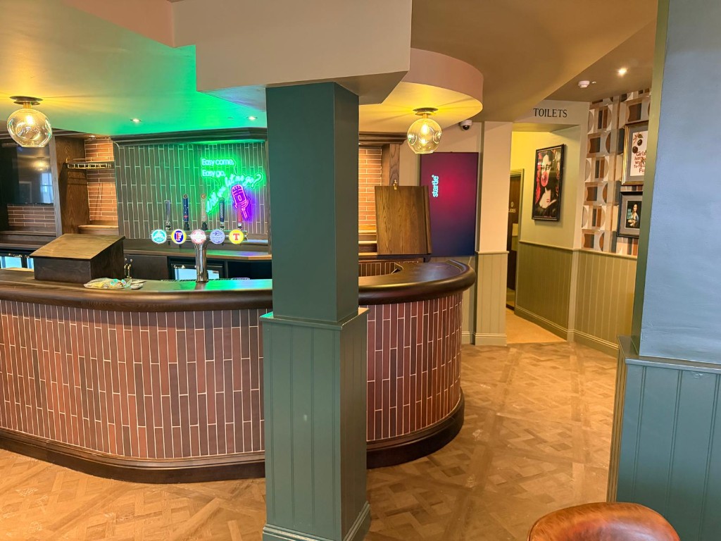 Completed — back bar taps and neon feature lighting