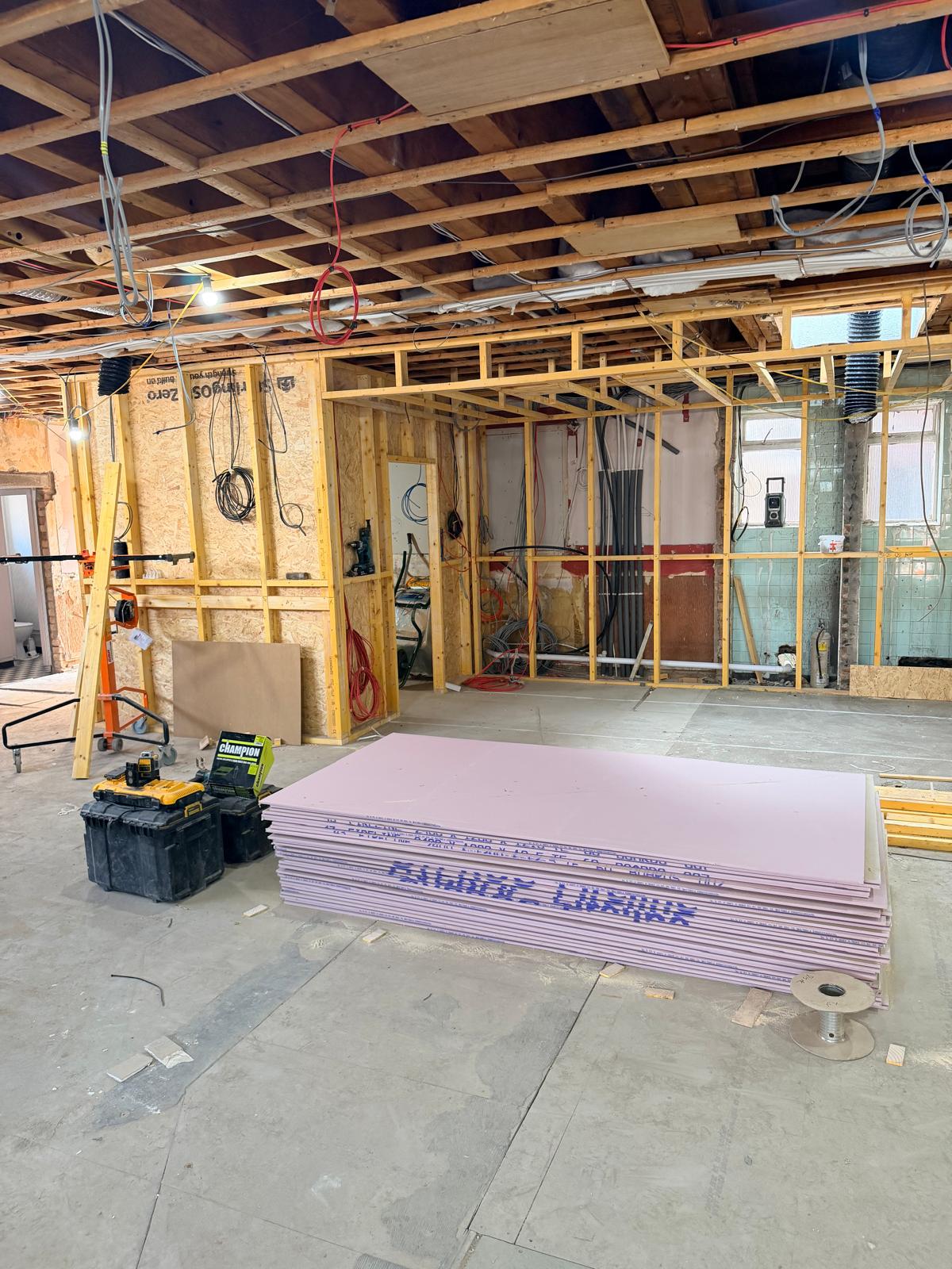 Update 17 July — stud partitions, boarding and materials on site