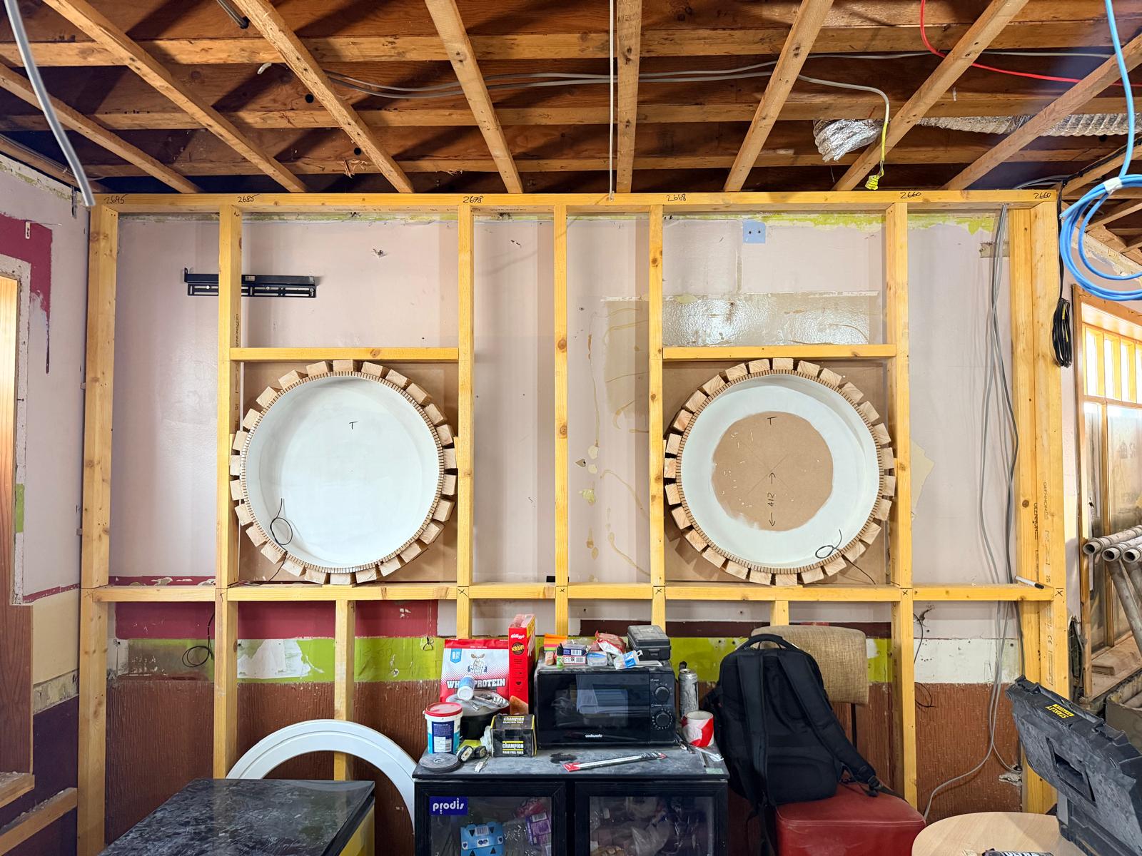 Update 17 July — custom circular feature framing on the feature wall